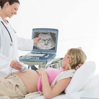 Doctor performing ultrasound