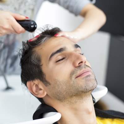 Young man at hairdresser