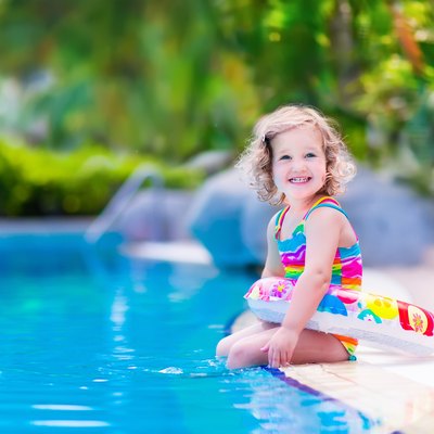 Sweet little girl in swimming pool