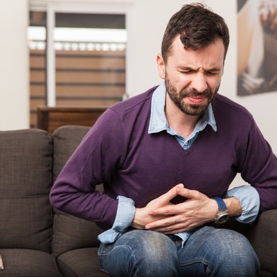 Young man with a stomach ache