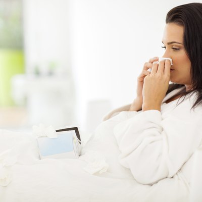 sick woman in bed