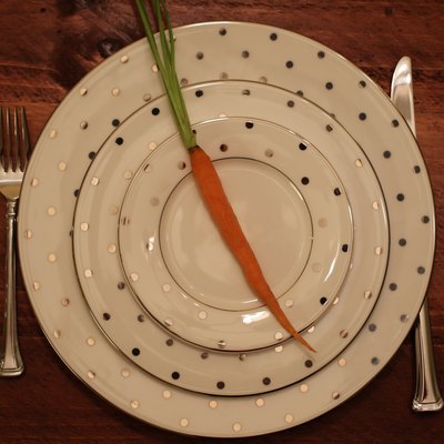 Food: empty plate setting with carrot