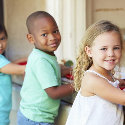 Elementary Pupils Collecting Healthy Lunch In Cafeteria
