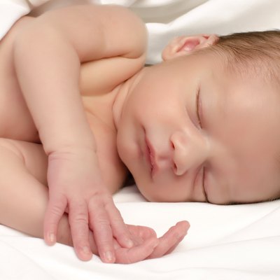 Beautiful innocent newborn sleeping.
