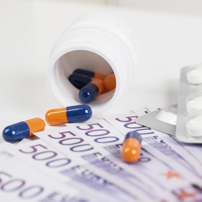 Medications Omeprazol, Metformin and 500 Euro notes