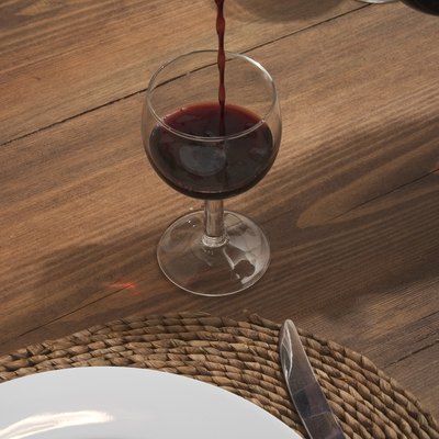 Pouring red wine