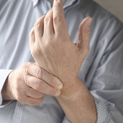 man has pain in wrist