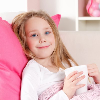 Happy sick child at home