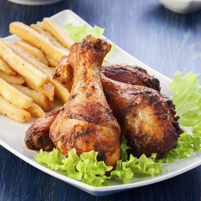 Chicken drumsticks with french fries