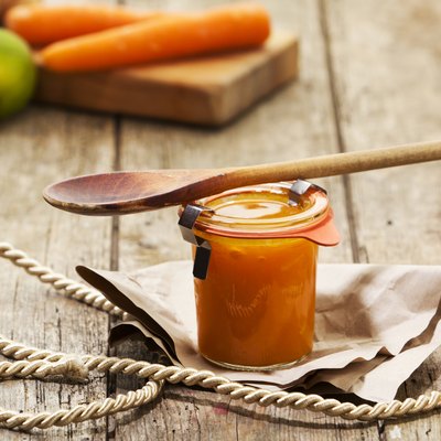 Handmade chutney from carrots, ginger and lime in jar