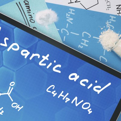 Tablet with the chemical formula of Aspartic acid .