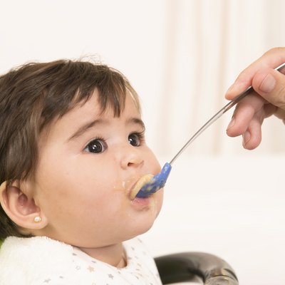 Feeding cute Lovely Baby Girl