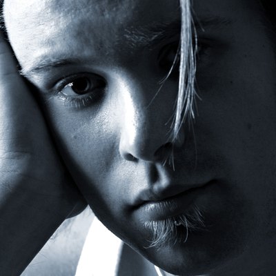 Close-up of a young man looking at camera