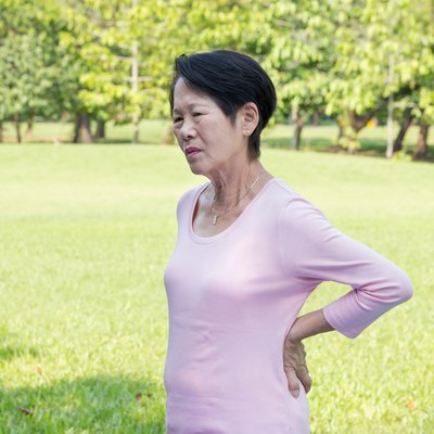 Asian senior woman back pain