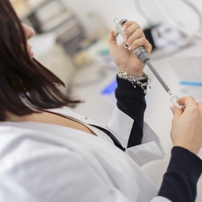 Young woman in the medical laboratory