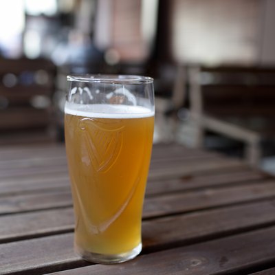 Glass of beer on table