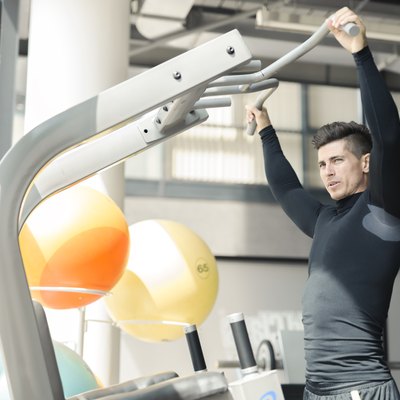 Young handsome man working out in a gym
