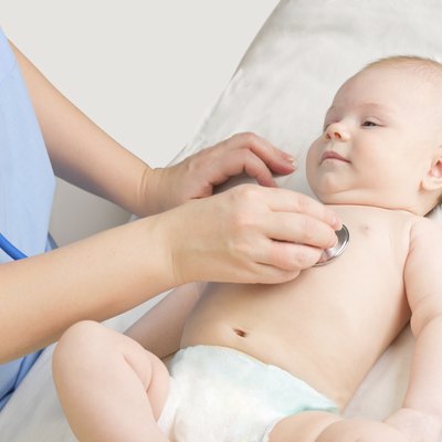 Baby girl with doctor