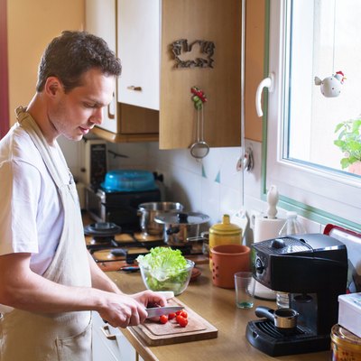 man cooking at home