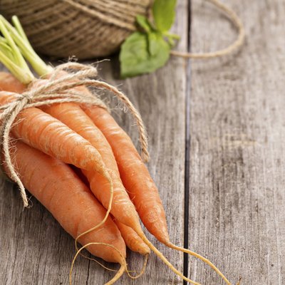 Fresh carrot with green leaves