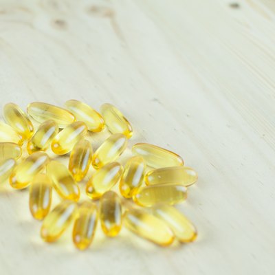 Fish Oil Arranged on wooden background