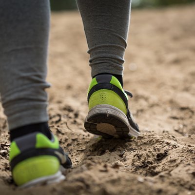 Close-up of runner's legs