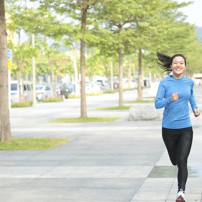 sports asian woman jogging