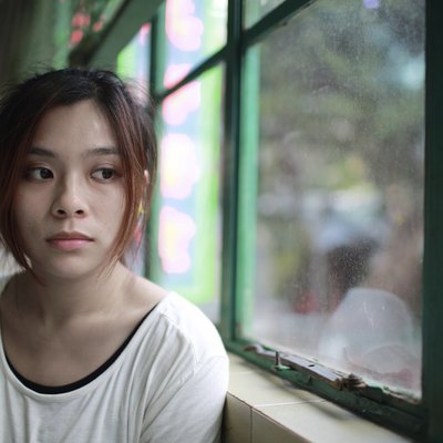 Sad woman waiting someone who is late