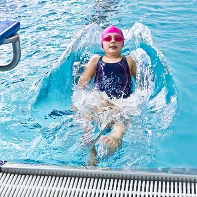 Girl in pink rubber hat