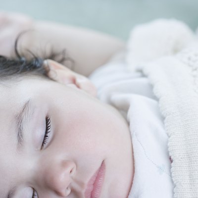 Close up of Hispanic baby sleeping