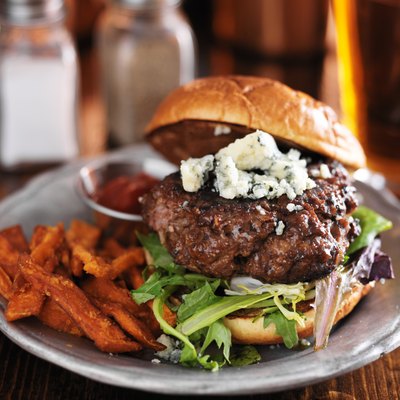 thick burger with blue cheese and sweet potato fries