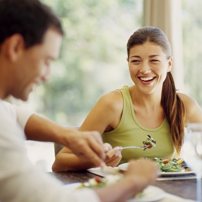 young couple having breakfast together
