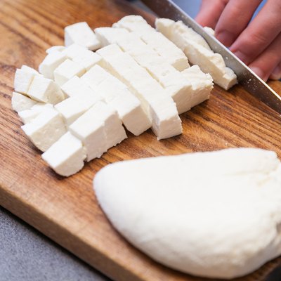 Cutting paneer into pieces