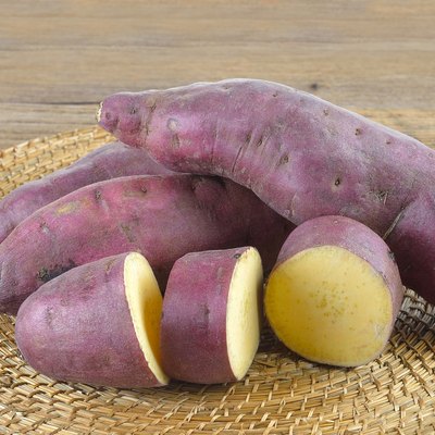 Fresh yam on wooden background