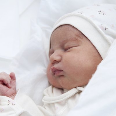 Newborn girl in the maternity hospital