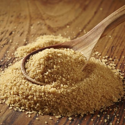 brown sugar heap on wooden table