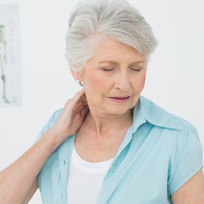 Senior woman suffering from neck pain