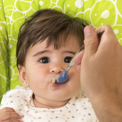 Feeding a cute Lovely Baby Girl
