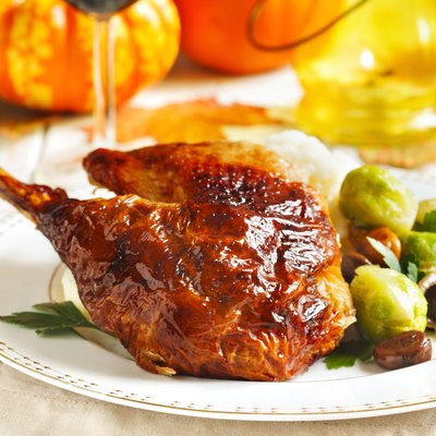 Roasted turkey leg with mash potato, chestnuts and brussels sprouts.