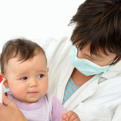 Doctor pediatrician and baby girl