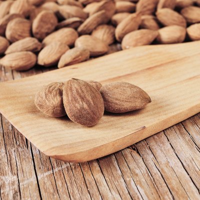 shelled almonds on a wooden table