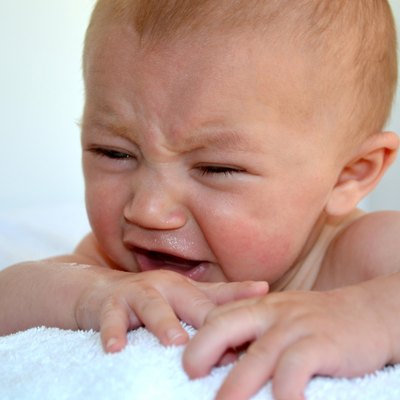 Infant boy showing upset
