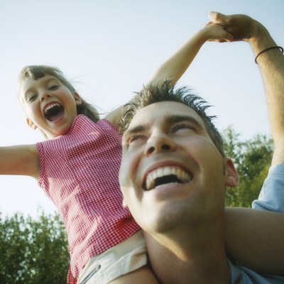 Sitting on daddys shoulders