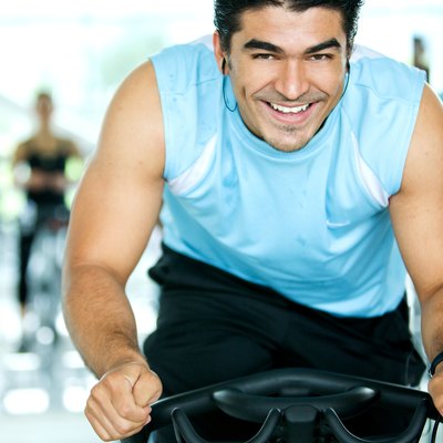 man spinning at the gym
