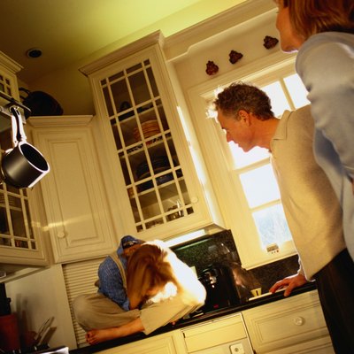 Below View of Parent's Scolding Their Daughter