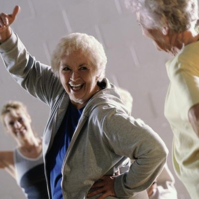 Group of senior women exercising in a health club