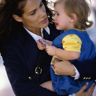 Close-up of a mother consoling her baby