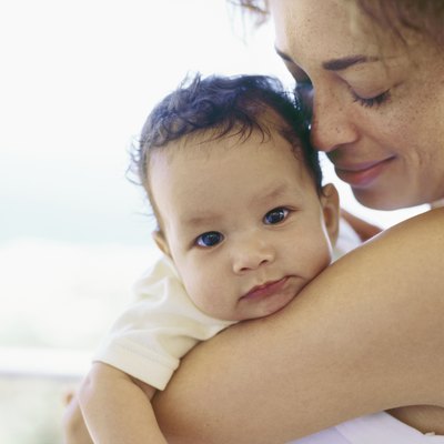 Close-up of a mother holding her baby boy