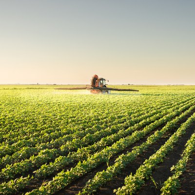 Tractor spraying pesticides