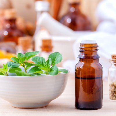 Natural Spa Ingredients essential oil with oregano leaves for ar